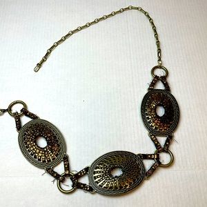 Bronze tone metal and leather belt